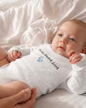 Load image into Gallery viewer, Wanted.Chosen.loved adoption onesie with baby boy footprints.
